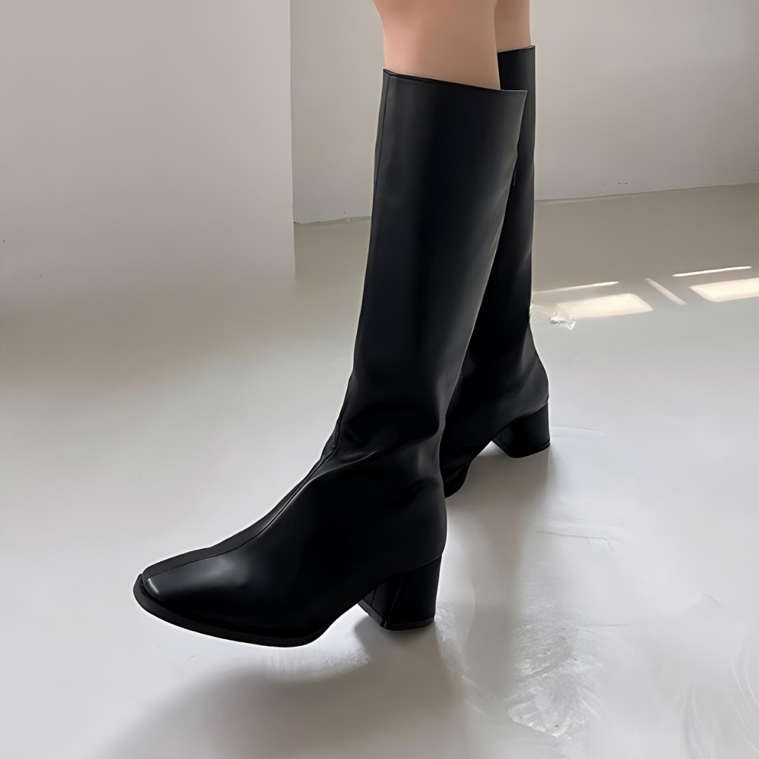 Botas elegantes de cuero hasta la rodilla
