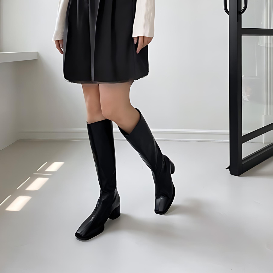 Botas elegantes de cuero hasta la rodilla