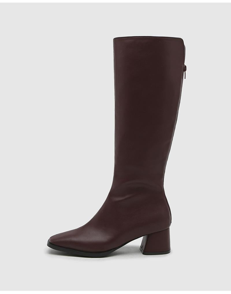 Botas elegantes de cuero hasta la rodilla